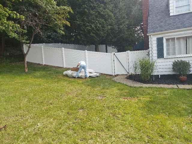 5' Khaki Vinyl Acadia Privacy Fence on backyard