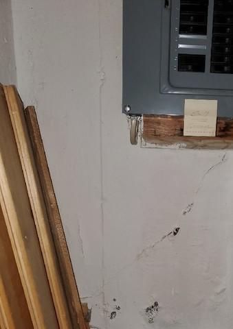 Small Crack and Water Damage in Foundation Wall