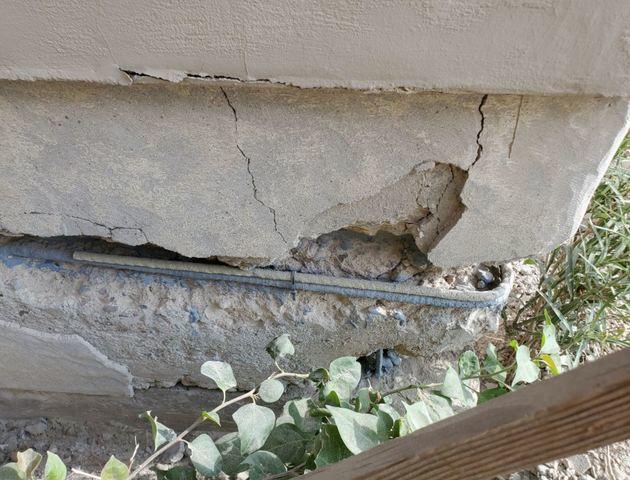 Symptoms of Stem Wall Failure: Spalling Concrete