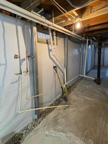 Our crew installed our WaterGuard, CleanSpace, and PowerBraces to waterproof the basement and repair the foundation.