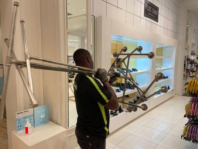 Our Lugger hard at work removing the stands from the store