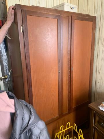Wardrobe in main bedroom ready for removal.
