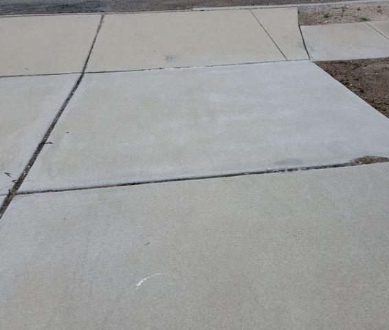 This is an after photo of the affected area. As you can see, the driveway is already leveled and is no longer a potential threat to the community.