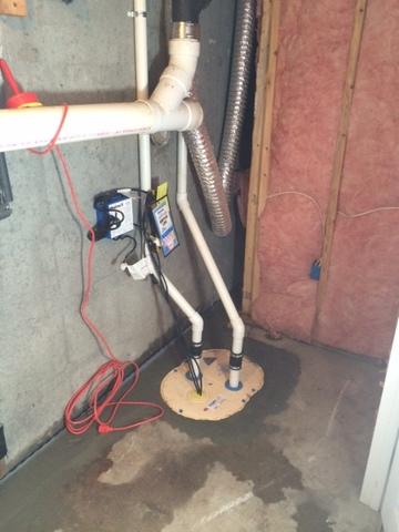 The Sump Pump Keeping this Basement Dry