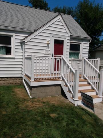 Remove railing and broken concrete top of the original deck.Build new treated frame and cover with Duralife decking with a new vinyl handrail