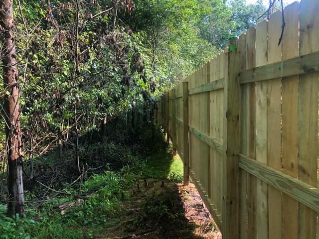 6' Privacy Natural Wood 4' 3 Rail Split Rail with Black Chain Link Installation