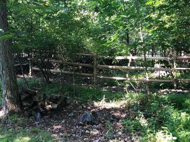 6' Privacy Natural Wood 4' 3 Rail Split Rail with Black Chain Link Installation