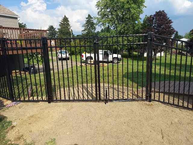 5' Black Classic, Commercial Grade, 3 Rail, Flush Bottom Aluminum Fence (1) 4' gate and (1) 8' double gate Inbstallation