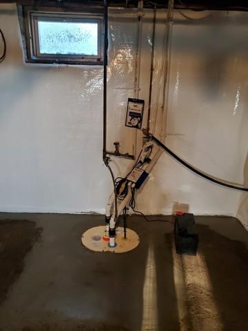 CleanSpace vapor barrier and a TripleSafe sump pump