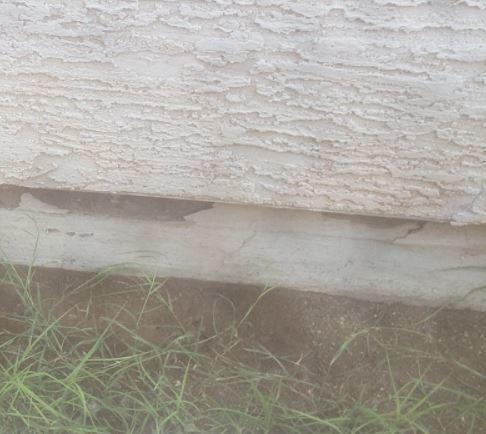 Signs of Advanced Rust in Stem Wall: Flaking Paint