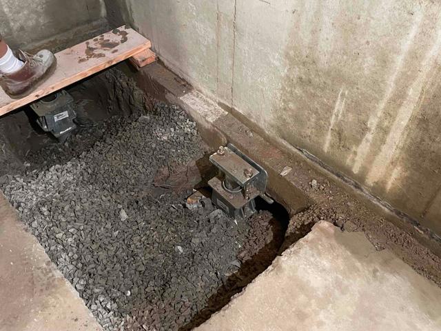 When excavating the outside, piers are installed inside the home through the basement floor.