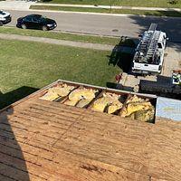 We removed the rotting wood off of this roof after stripping it. We will replace it with new wood.