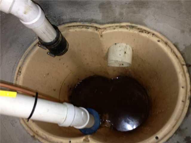 This sump pump had dirt and soil inside. Our service team will thoroughly clean this pump system and ensure it's operating at its best performance.