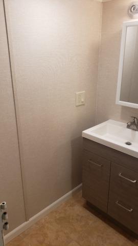 This photo shows how modern and bright our EverLast Wall Panels are. They are easy to clean and mold/water resistant. A perfect fit for a basement and especially in a basement bathroom.