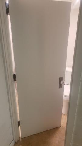 The new bathroom door has been installed and the bathroom is finished.