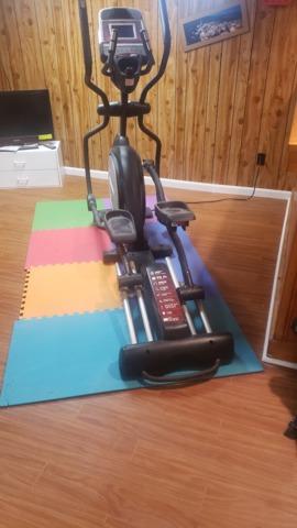 The homeowner's workout equipment looks right at home on our Thermal Dry Elite Plank Floors. We agree with the elliptical manufacturer that it's good for homeowners to put pads under heavy workout equipment. Our Thermal Dry Elite Plank Floors can take the weight and force from using this equipment, but it will cut down on strain on the machine if you put it on pads. These colorful ones look festive against our floors!