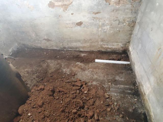 Running Our Perforated Pipe Underneath The Wall