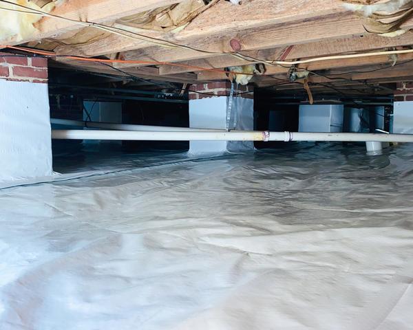 A completed CleanSpace Encapsulation System should make the crawl space nice and bright, providing excellent coverage against water vapor entering the crawl space.