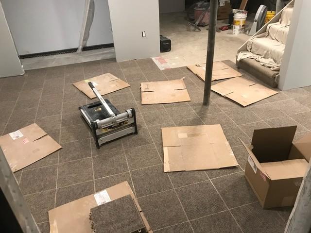 The homeowners chose our Thermal Dry Elite Tile Flooring for their basement. It wears just as well as our Thermal Dry Elite Plank Floors but has a more utilitarian look. It will last for years to come.