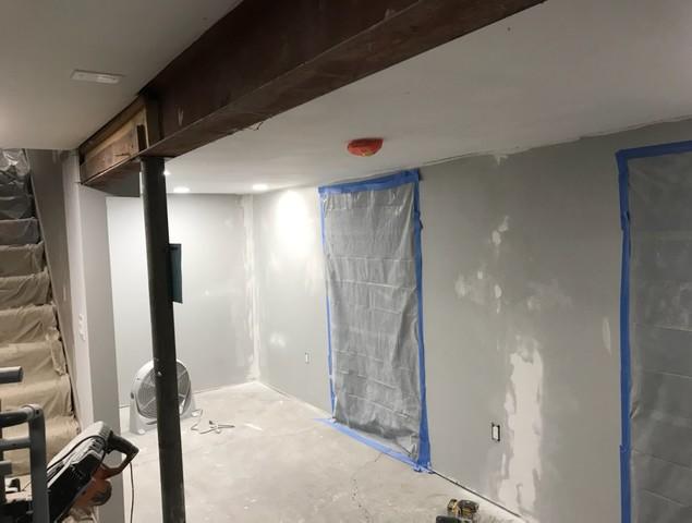 The homeowners chose our paintable EverLast Wall Panels for their basement. Most homeowners chose our regular EverLast Panels as they are finished to be easy to clean, but the paintable EverLast panels are a durable choice when you want to add more color to your basement.