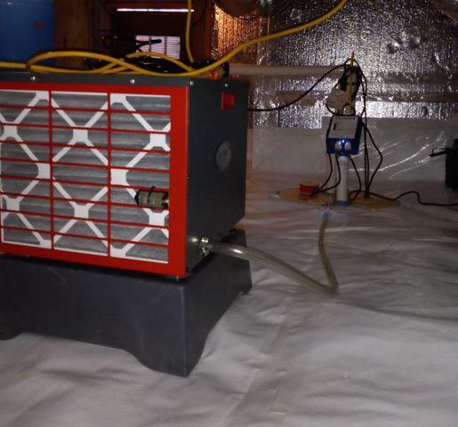 This dehumidifier helps the purpose of the encapsulation by keeping the basement dry in this house in Prescott, AZ.