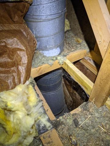Exposed and unsealed chaseway in attic in Normal, IL