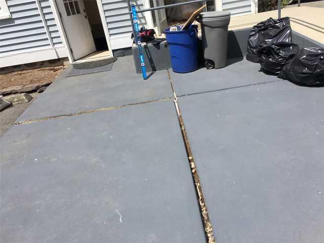 The homeowner contacted Quality 1st Basement Systems after seeing their patio sinking.