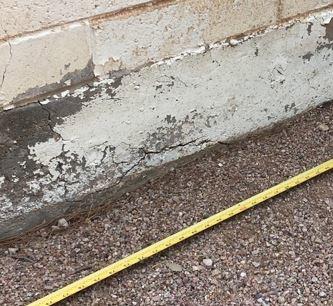 Symptoms of Stem Wall Failure: Horizontal Concrete Cracks