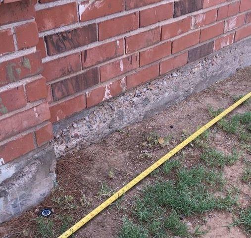 Symptoms of Stem Wall Failure: Spalling Concrete