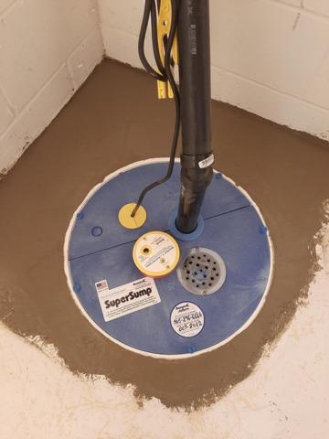 Concrete is troweled on