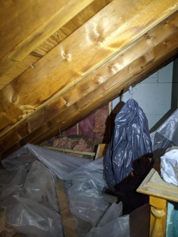 Unsealed and uninsulated adjoining garage wall, knee wall unsealed