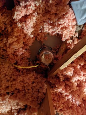 Unsealed can light in attic floor in Washington IL