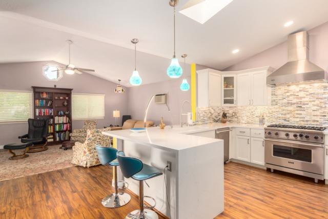 Opening the wall of this kitchen up created such a welcoming, airy space.