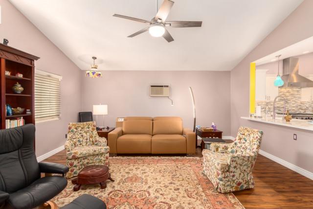 <p>The opened-up wall allows the family to visit and feel more connected.</p>