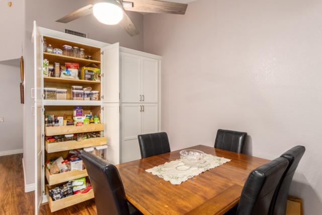 <p>Pull-out drawers make everything easier in this perfect pantry setup!</p>