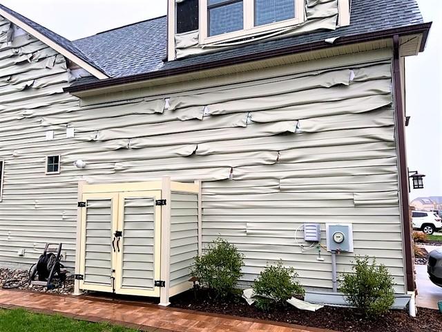 <p>The neighboring house had a fire which then blew into this one and damaged all the siding. </p>