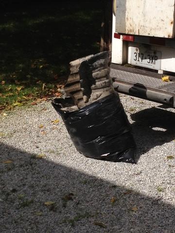 This is the old black, open liner from the basement. These liners allow odors, moisture and radon gas into your home.