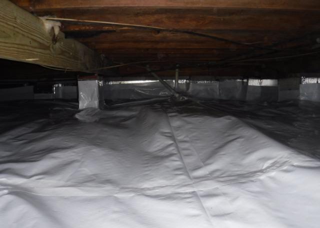 A completed CleanSpace Encapsulation System should make the crawl space nice and bright, providing excellent coverage against water vapor entering the crawl space.