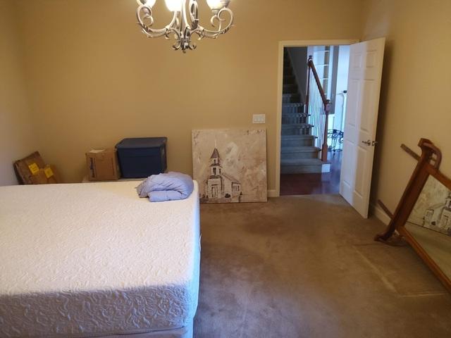 We had moved some things into the master bedroom, at the time of this picture, but we had a vanity and a dresser with a mirror on it that we also moved into this room and setup.