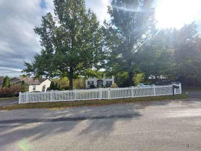 4' White Vinyl Olympic Concave Fence New England Caps, (1) 3' gate, (1) 6' double gate Installation