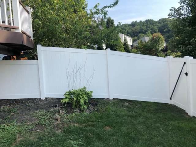 4' and 6' Vinyl Acadia Privacy Fence backyard (1) 3' gate / (1) 6' double gate