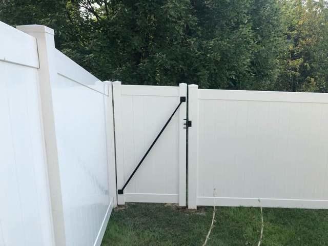 4' and 6' Vinyl Acadia Privacy Fence backyard (1) 3' gate / (1) 6' double gate