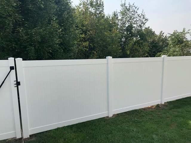 4' and 6' Vinyl Acadia Privacy Fence backyard (1) 3' gate / (1) 6' double gate