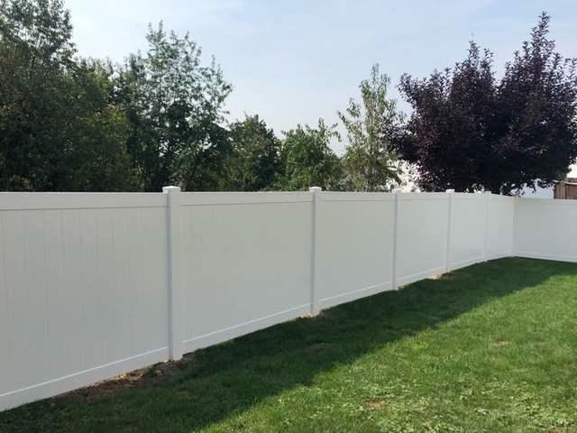 4' and 6' Vinyl Acadia Privacy Fence backyard (1) 3' gate / (1) 6' double gate