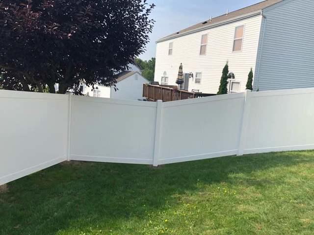 4' and 6' Vinyl Acadia Privacy Fence backyard (1) 3' gate / (1) 6' double gate