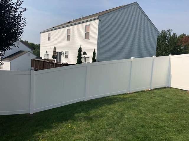 4' and 6' Vinyl Acadia Privacy Fence backyard (1) 3' gate / (1) 6' double gate