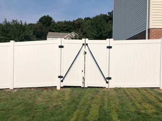 4' and 6' Vinyl Acadia Privacy Fence backyard (1) 3' gate / (1) 6' double gate