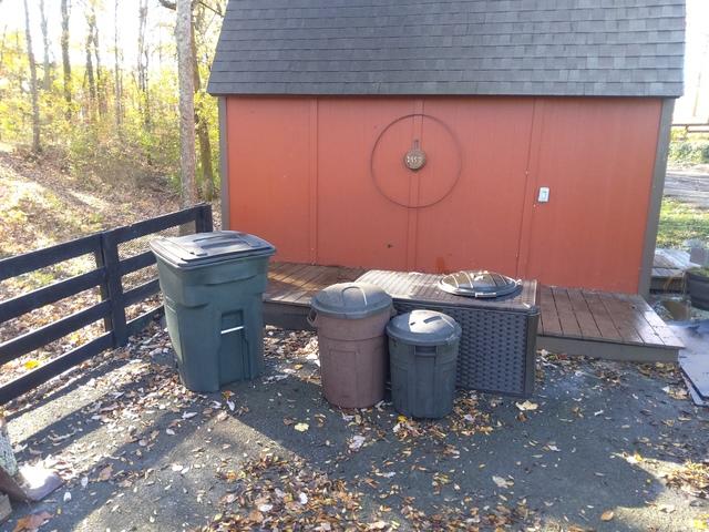Not only did we remove all of these items and empty the garbage cans for our customer, but we also swept up the area, which is our custom when we clear out spaces on hard surfaces.