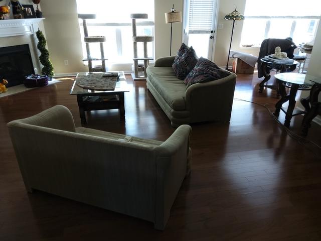The customer wanted the sofa removed and the love seat moved upstairs for her.
