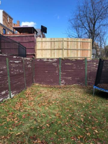 4' Black Classic Aluminum Fence, 3 Rail, Flush Bottom, Commercial Grade and 6' Natural Privacy Pressure Treated Wood